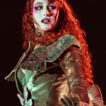 Chappell Roan performing in a fully covered stage costume