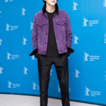 Timothée Chalamet wearing a purple jacket at the 2017 Berlin Film Festival
