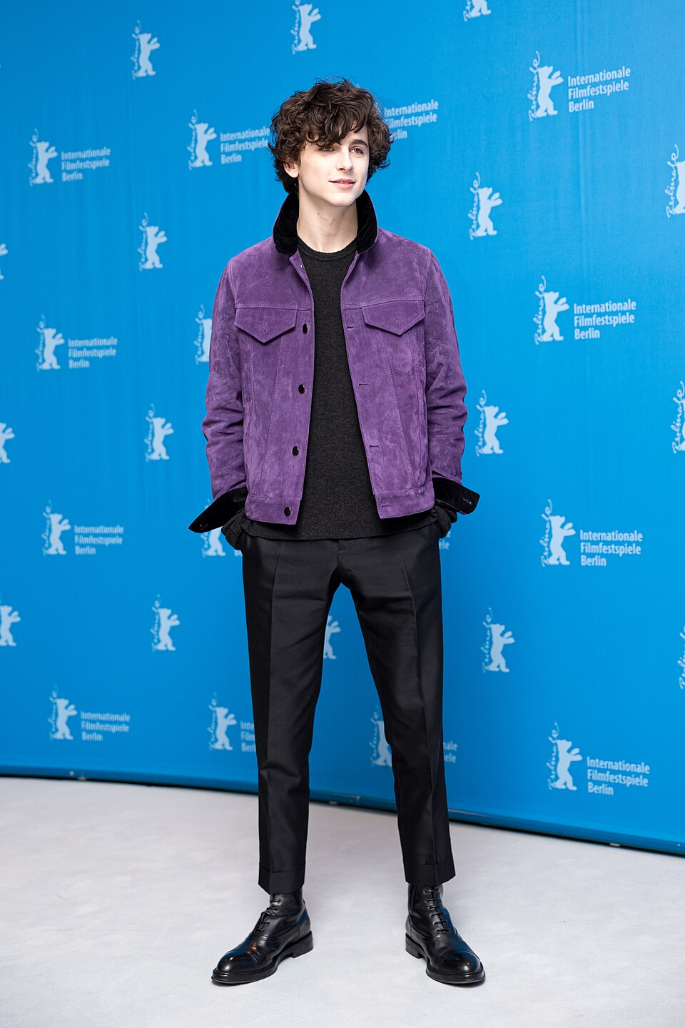 Timothée Chalamet wearing a purple jacket at the 2017 Berlin Film Festival