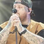 Jelly Roll singing into a microphone at the 2024 Global Citizen Festival