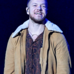 Dan Reynolds performing with Imagine Dragons in 2017