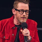 Portrait of Macaulay Culkin at a Home Alone anniversary event in 2025