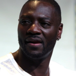 Adewale Akinnuoye-Agbaje speaking at San Diego Comic-Con in 2016