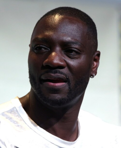 Adewale Akinnuoye-Agbaje speaking at San Diego Comic-Con in 2016