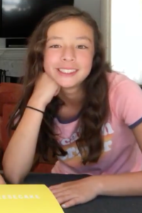 Portrait of Aubrey Anderson-Emmons in a 2018 FoodMania Review video
