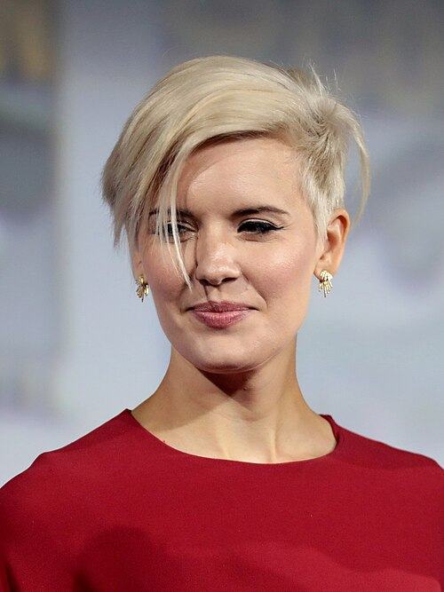 Maggie Grace speaking at San Diego Comic-Con in 2019